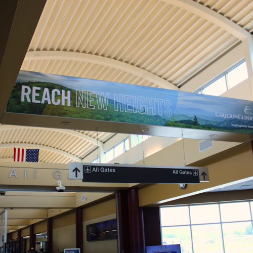 A large banner displayed in the Roanoke Blacksburg Regional Airport
