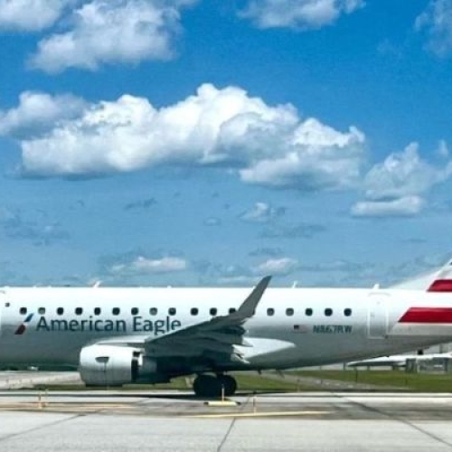 A plane sitting on a tarmac