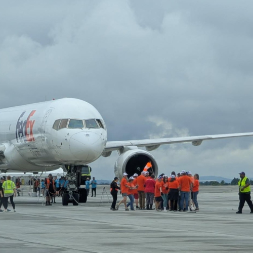 Teams pulling FedEx plane