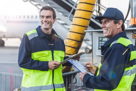 workers near an airplane