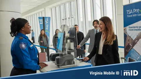 Image of travelers waiting in TSA line with TSA representative. A decorative graphic says Virginia Mobile ID